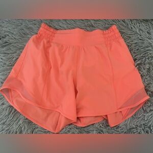 Super cute coral colored Lululemon Hotty Hot shorts!